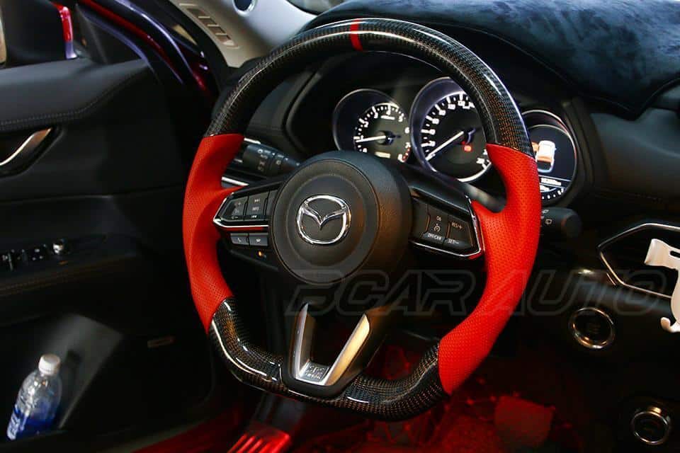 boc-vo-lang-mazda-3-1 Tại sao nên bọc vô lăng cho ô tô Mazda?