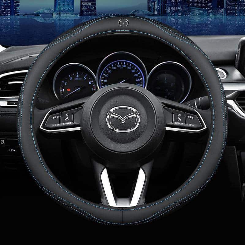boc-vo-lang-mazda-da-bo-that Bọc vô lăng xe Mazda da bò thật