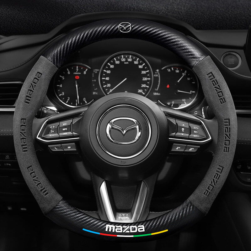 boc-vo-lang-o-to-mazda Bọc Vô Lăng Da Lộn Sợi Carbon Cho Xe Ô Tô Mazda 2