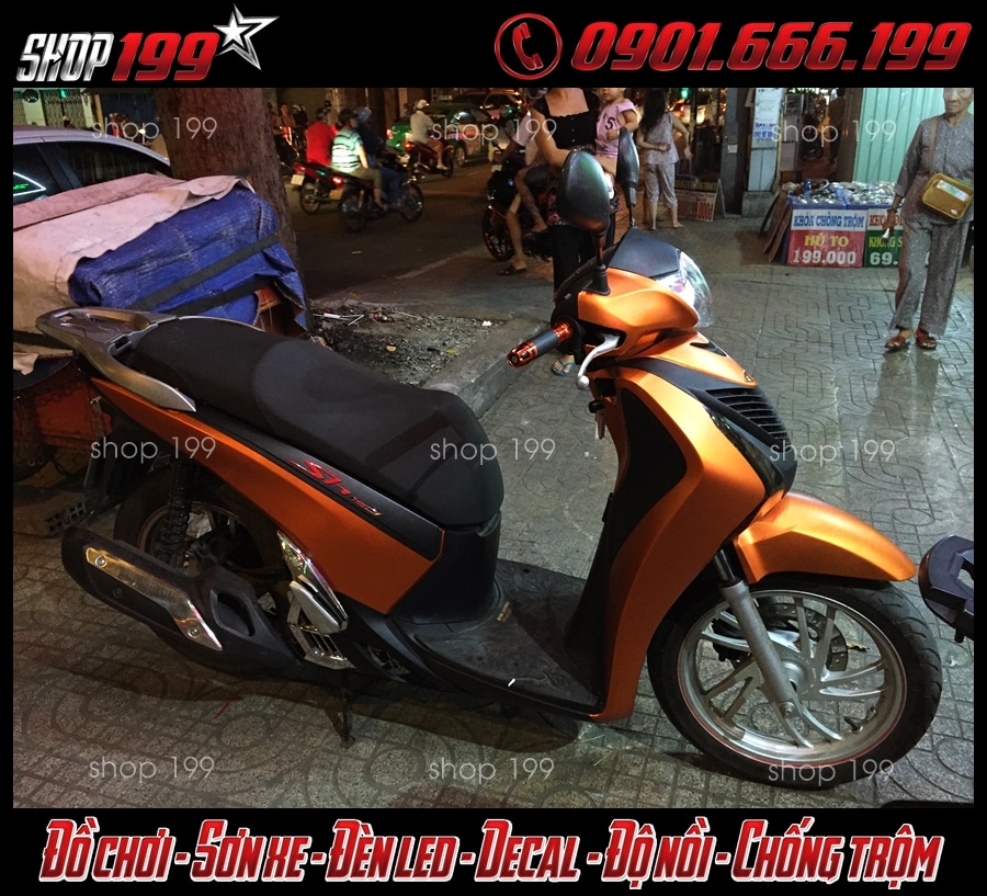 hinh-anh-dan-keo-xe-doi-mau-sh-gia-re-tai-hcm-2076-2 Honda SH dán keo đổi màu thành màu cam hợp với những người mệnh thổ