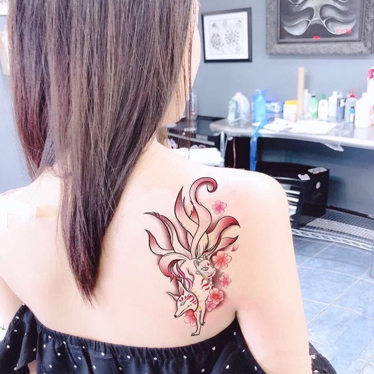 hinh-xam-lung-cao-chin-duoi hình xăm lưng cá chép hóa rồng
