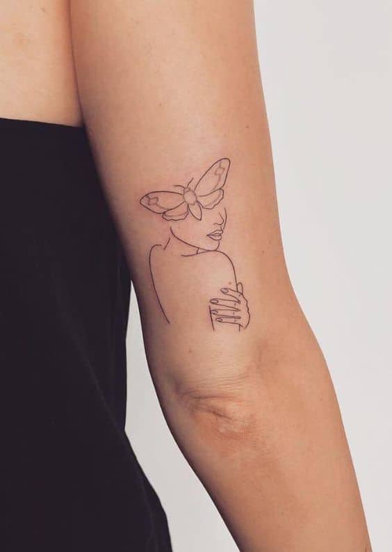 tattoo-co-gai-mini-co-con-buom-tren-dau tattoo cô gái mini có con bướm trên đầu