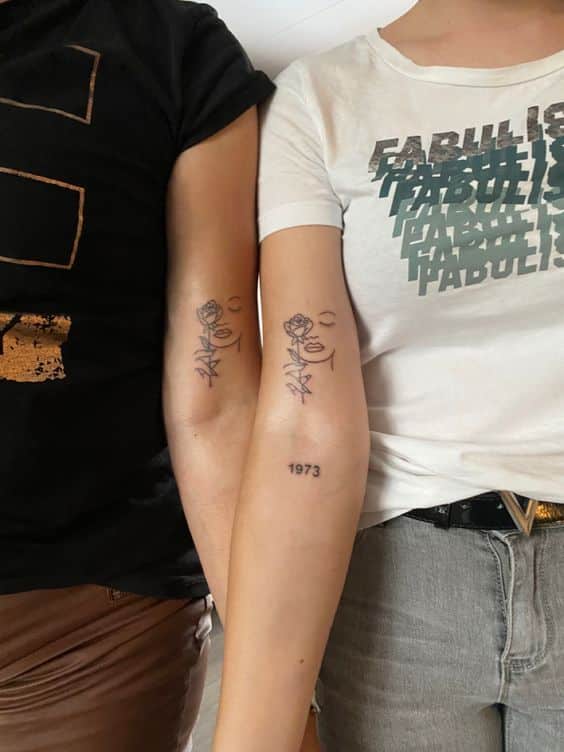 tattoo-co-gai-mini-lay-hoa-hong-che-mat tattoo cô gái mini lấy hoa hồng che mặt