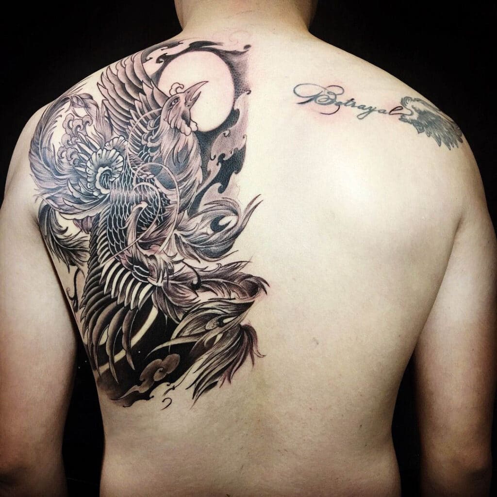 tattoo-designs-hinh-xam-phuong-hoang-den-trang-33-1 99+ Hình xăm phượng hoàng: Đẹp, Sang, Độc, Ý nghĩa nhất. 4.1/ Hình xăm phượng hoàng đen trắng. Hình xăm phượng hoàng - Ý nghĩa loài chim bí ẩn tuyệt đẹp ...