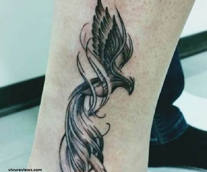 tattoo-designs-hinh-xam-phuong-hoang-den-trang-5-1 Hình xăm phượng hoàng đen trắng ở chân - mẫu 8